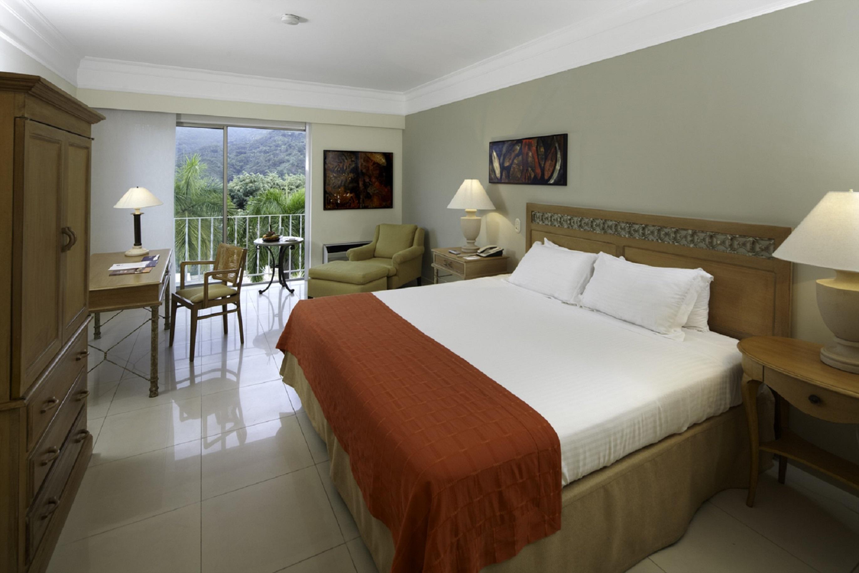 Hotel Estelar Altamira Ibagué Chambre photo A room at the hotel