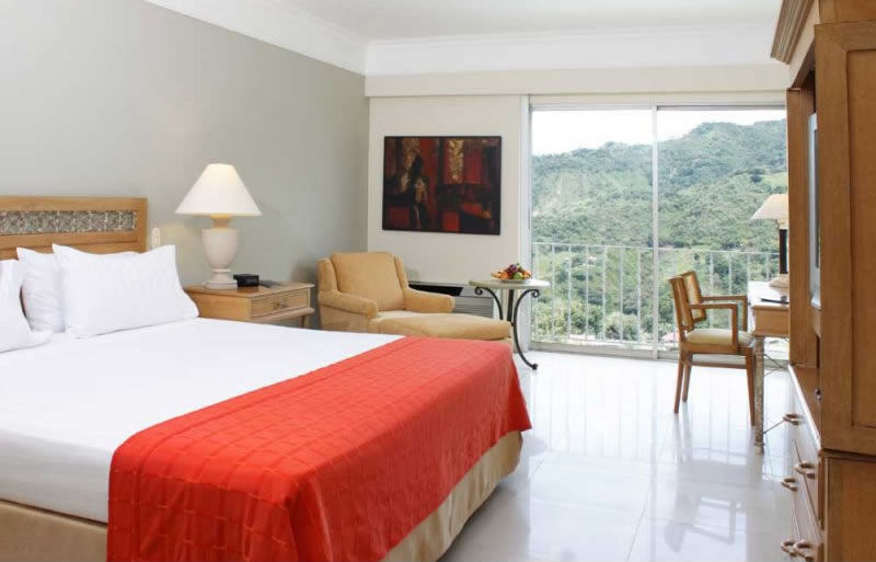 Hotel Estelar Altamira Ibagué Extérieur photo A room at the hotel